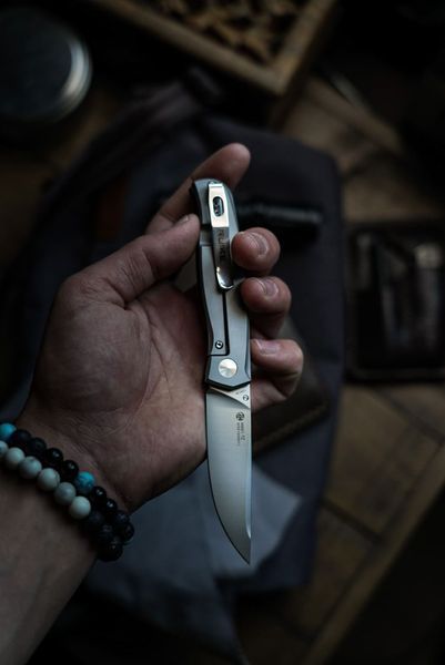 Ніж складаний кишеньковий Ruike M661-TZ, (7.4 см) steel 154СМ / G10 чорний 63335 фото